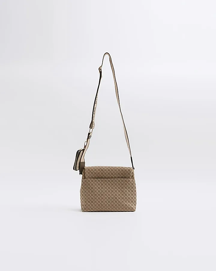 Brown RI monogram fold over cross body bag