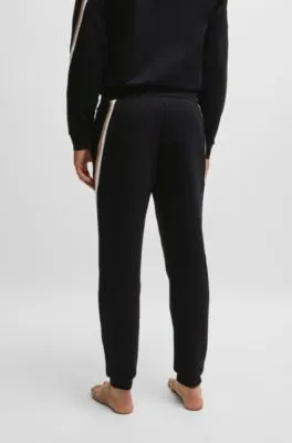 Cotton-terry tracksuit bottoms with signature-stripe tape