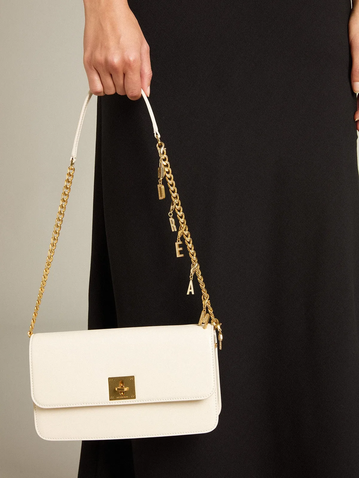 Gioia Bag in butter-colored boarded leather with gold details