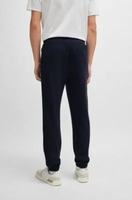 Regular-fit tracksuit bottoms in performance fabric